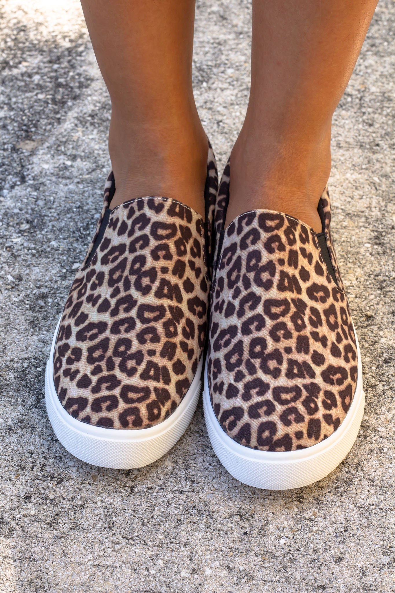 white sneakers with cheetah print back