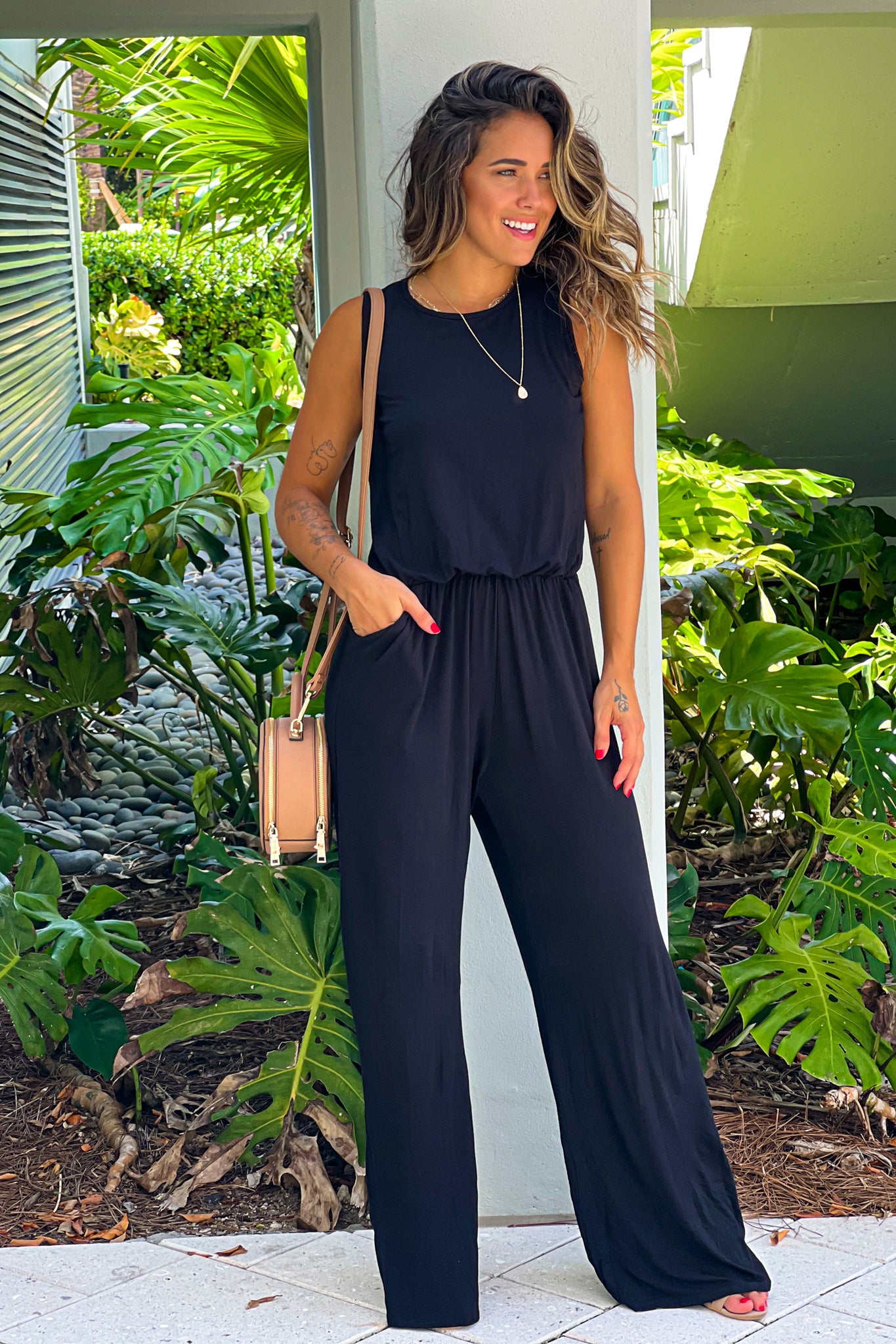 black jumpsuit with pockets