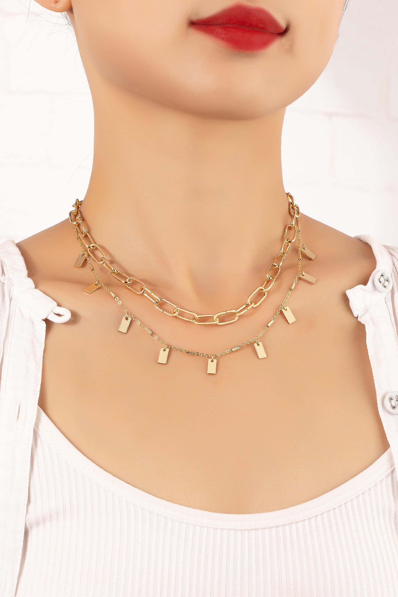 gold two row chain necklace with charms