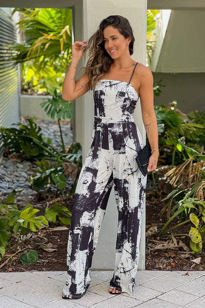 black and white printed jumpsuit with criss cross back