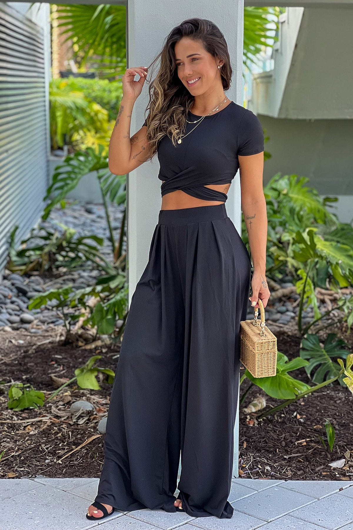 Black Criss Cross Crop Top And Pants Set | Online Boutiques Saved by the Dress Black Criss Cross Crop Top And Pants Set | Online Boutiques Saved by the Dress