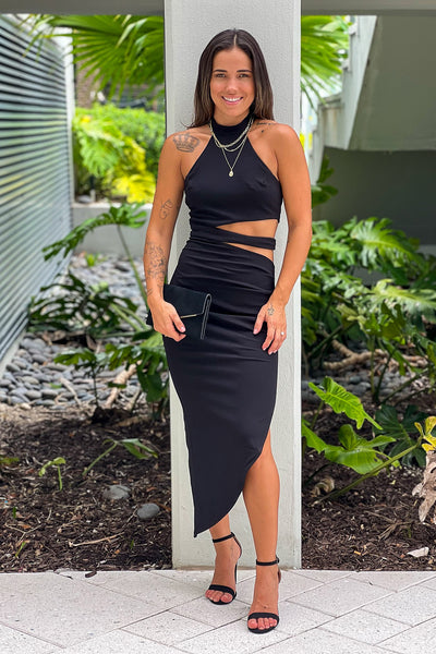 black halter neck asymmetrical dress with cut out