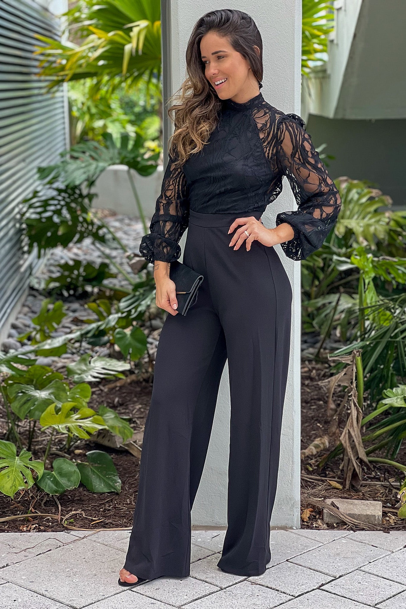 black jumpsuit with lace sleeves