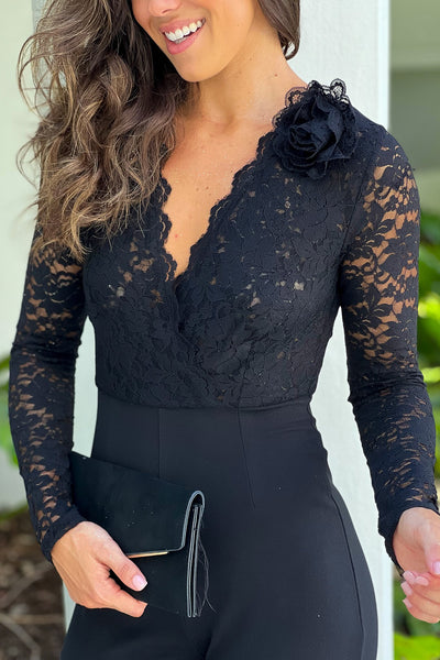 black lace jumpsuit with brooch