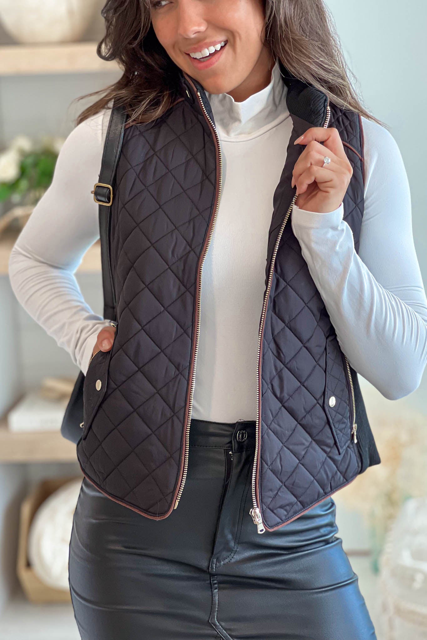 black quilted vest with front pockets