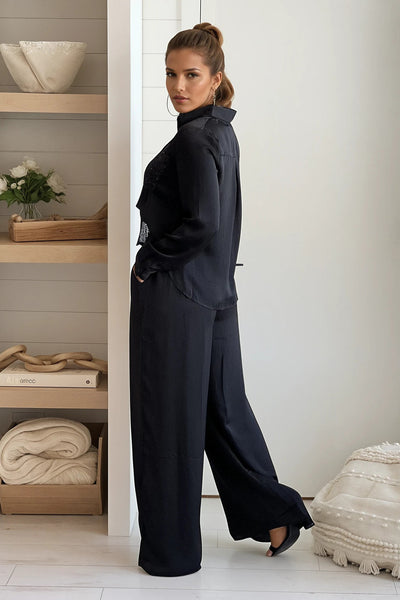 black shirt and pants set