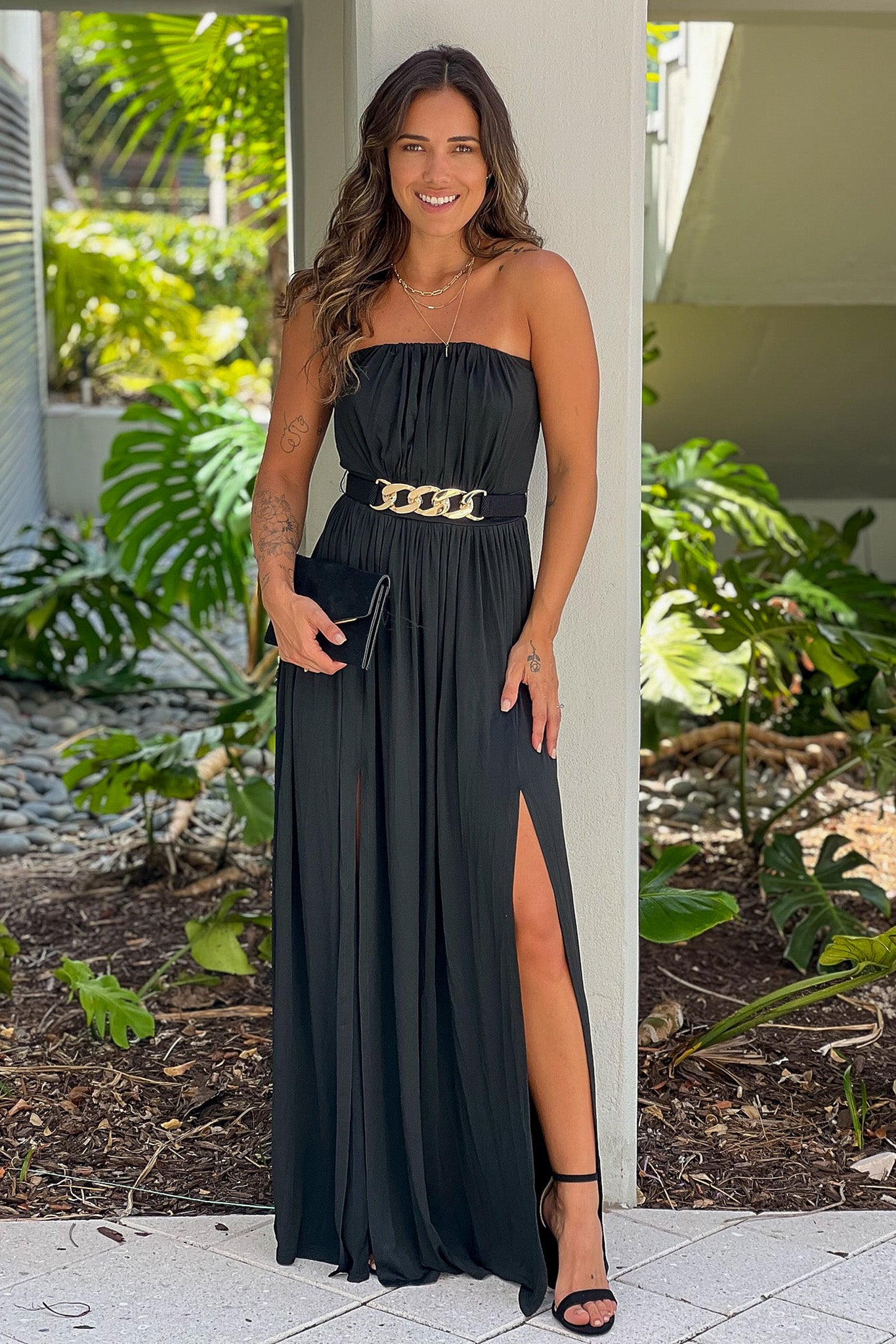 black strapless maxi dress with chain belt