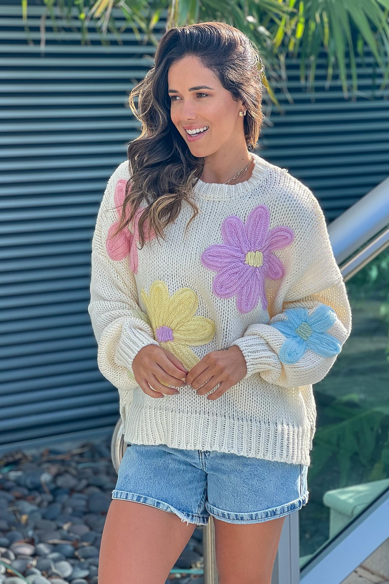 cream sweater with flowers