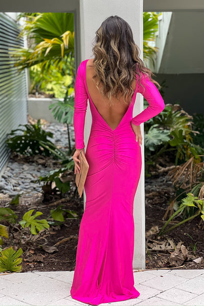 fuchsia maxi dress with open back and long sleeves