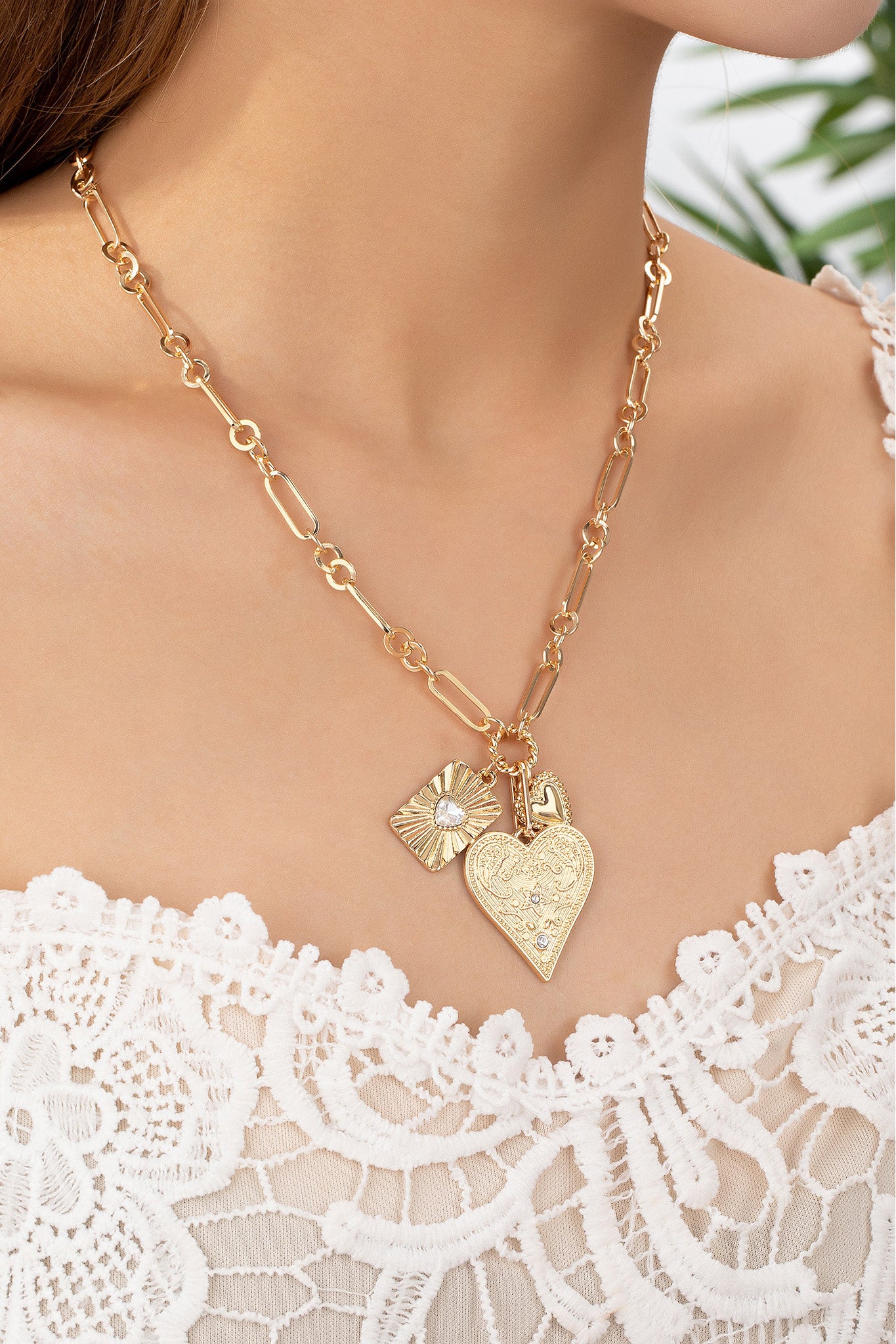 gold 3 heart charm cluster necklace