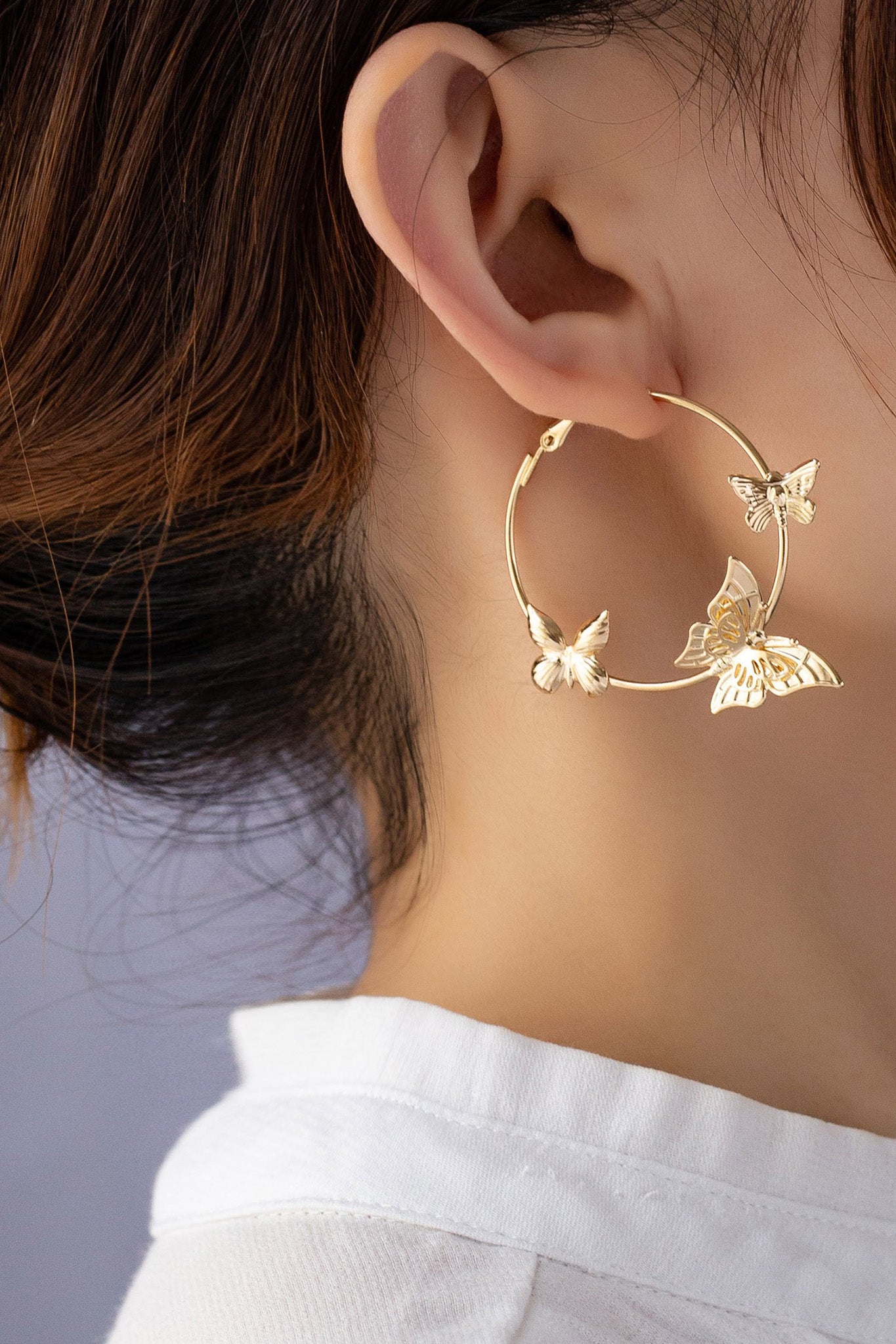 gold butterfly hoop earrings