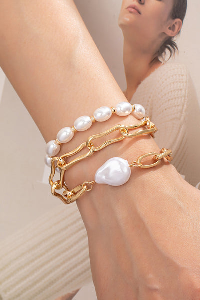 gold chunky chain bracelets set with pearls