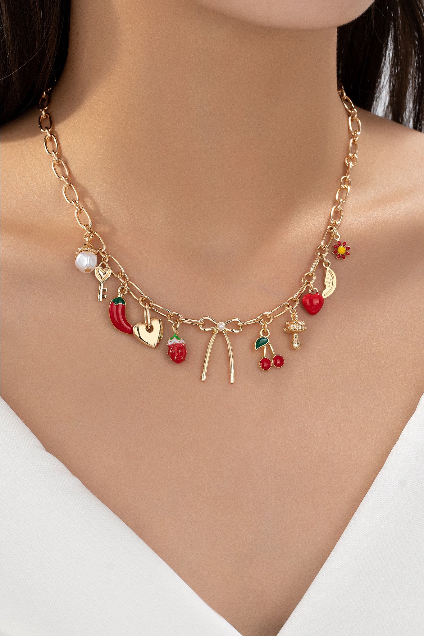 gold fruit heart and bow charm necklace