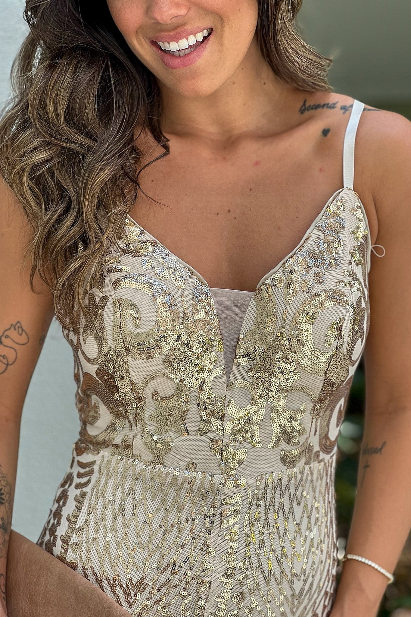 gold jumpsuit with sequins