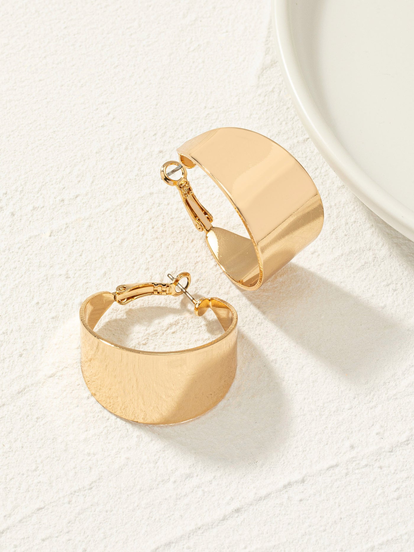 gold wide hoop metal earrings