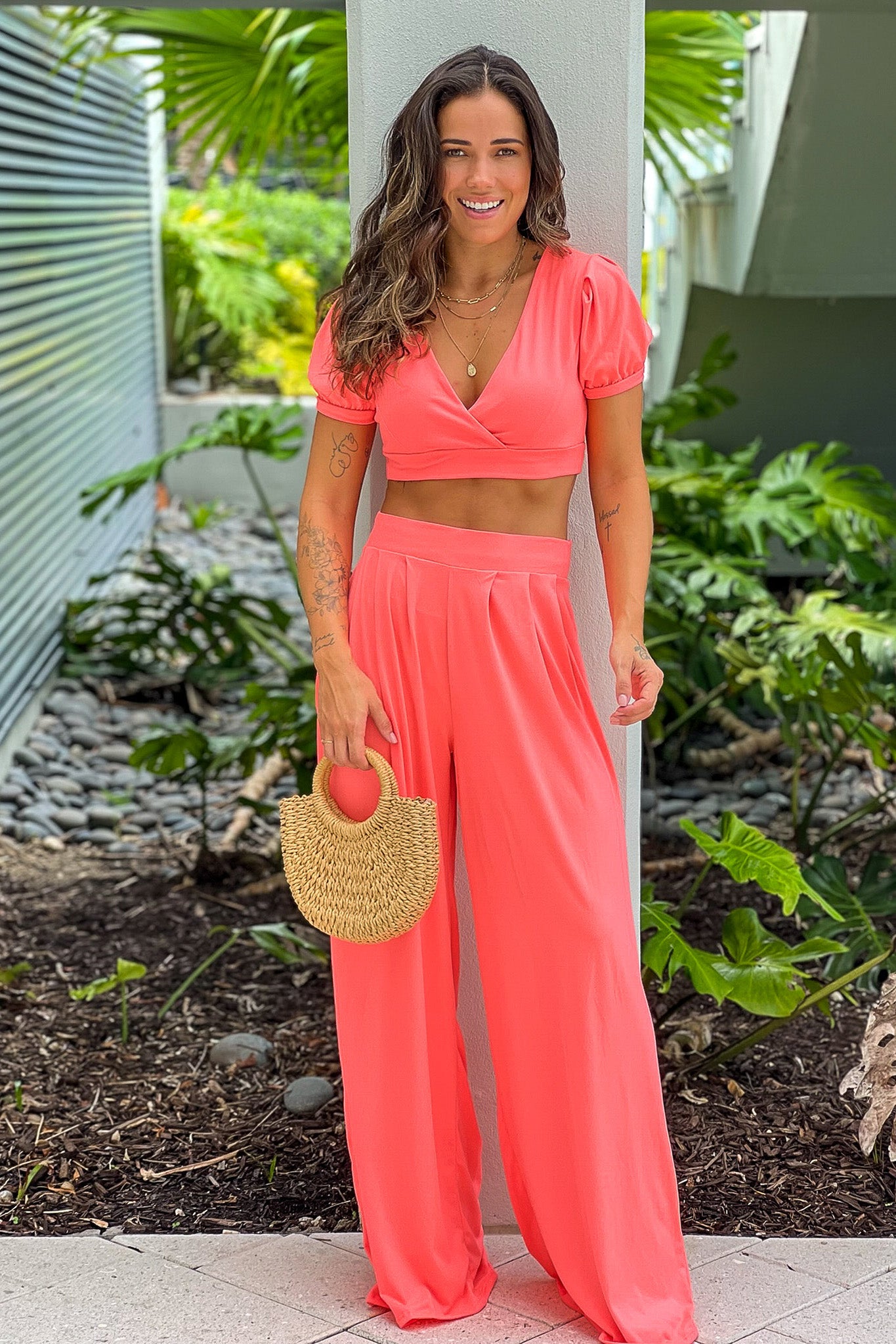 neon coral pants and crop top set