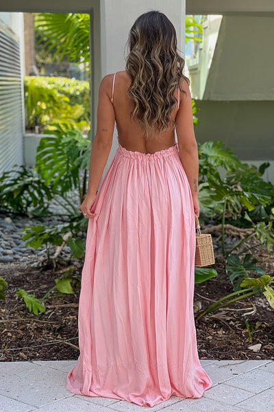 pink maxi dress with open back and frayed hem
