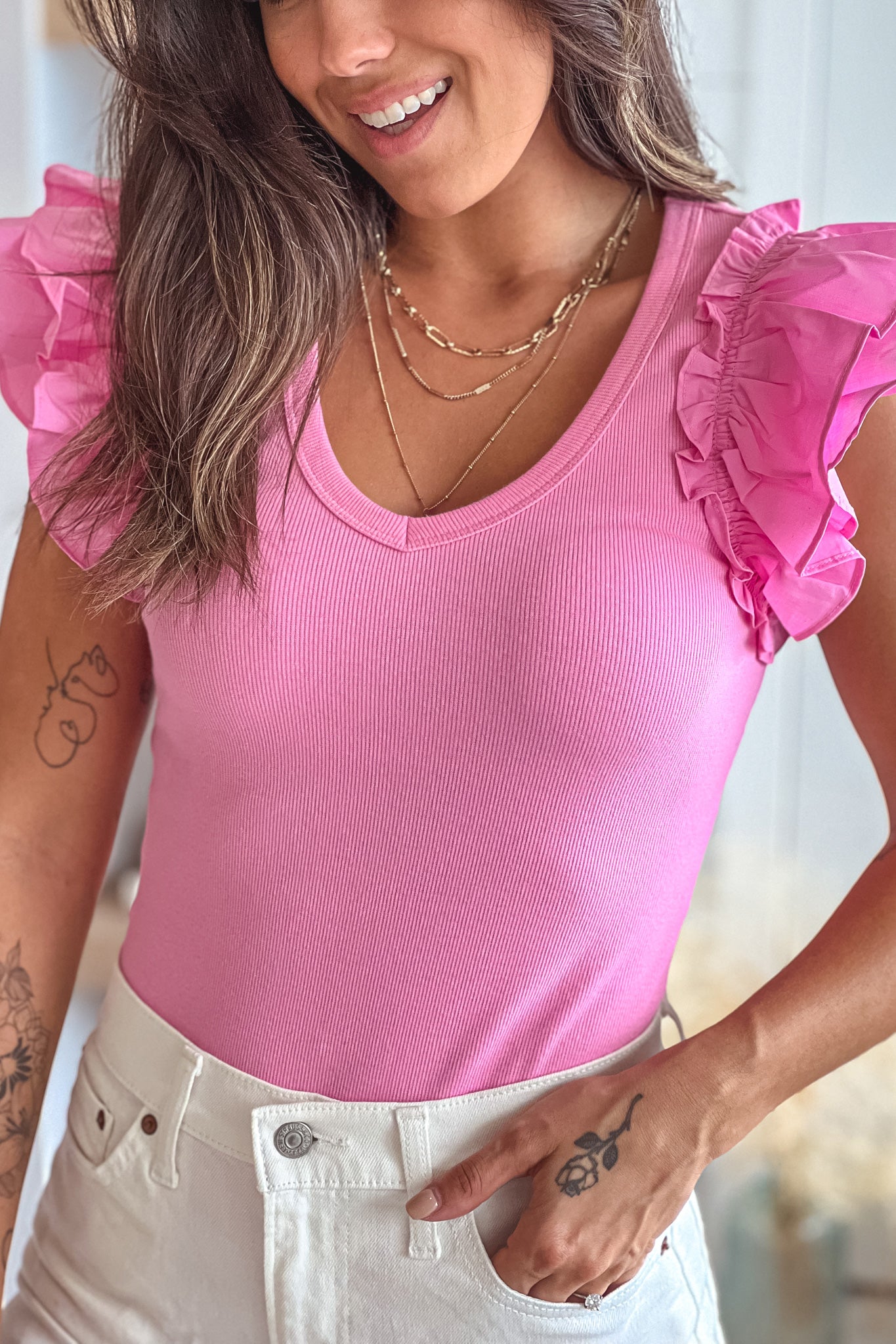 pink ruffled sleeve v-neck bodysuit