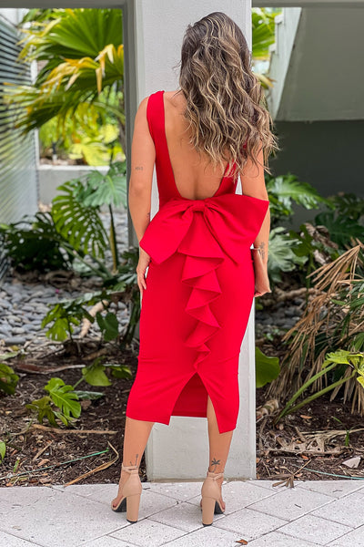 red midi dress with open back and bow