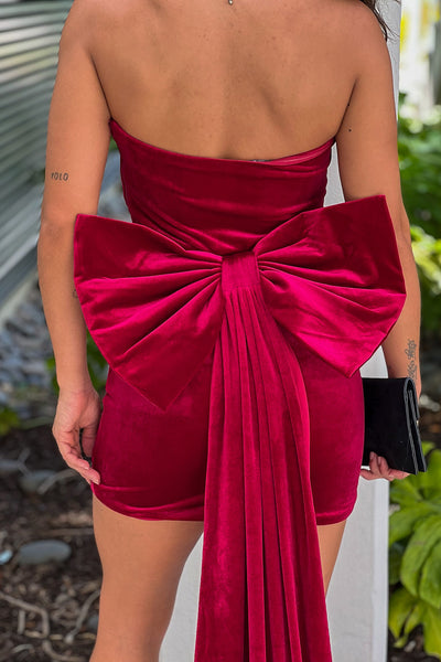 red ruched short dress with bow detail