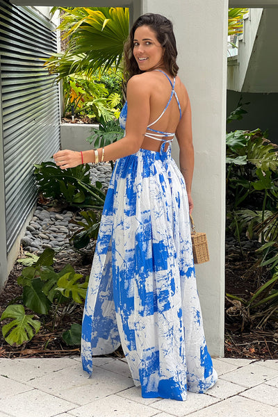 white and blue printed maxi dress with criss cross back