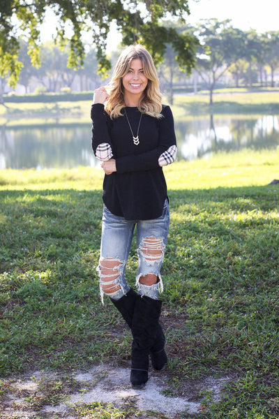 black top with patches