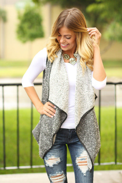black and white asymmetrical vest