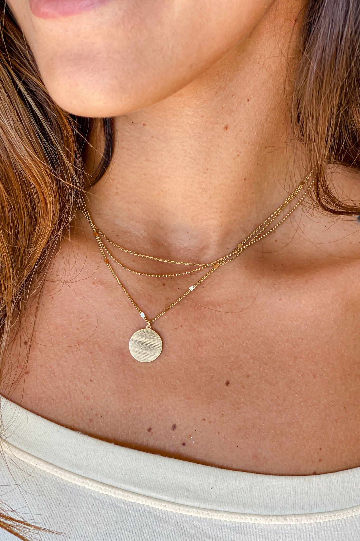 Gold Layered Necklace with Disc Pendant