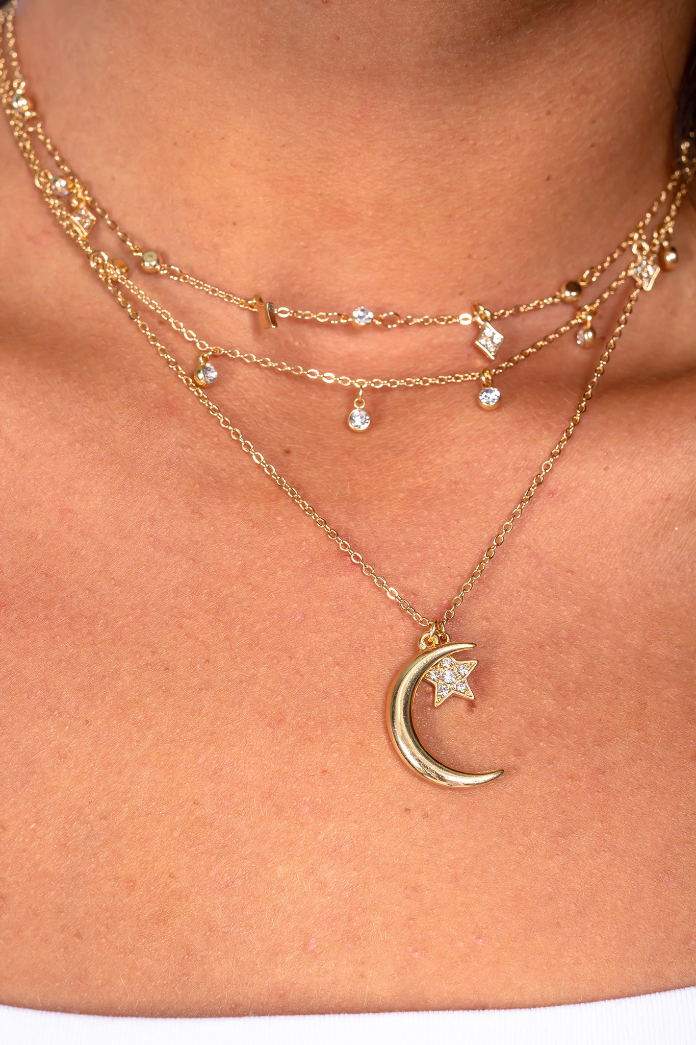Gold Layered Necklace with Moon and Star Pendant
