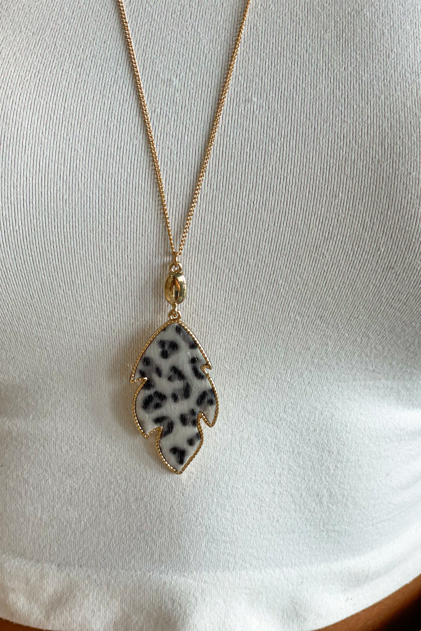 Gold and Black Animal Print Pendant Necklace