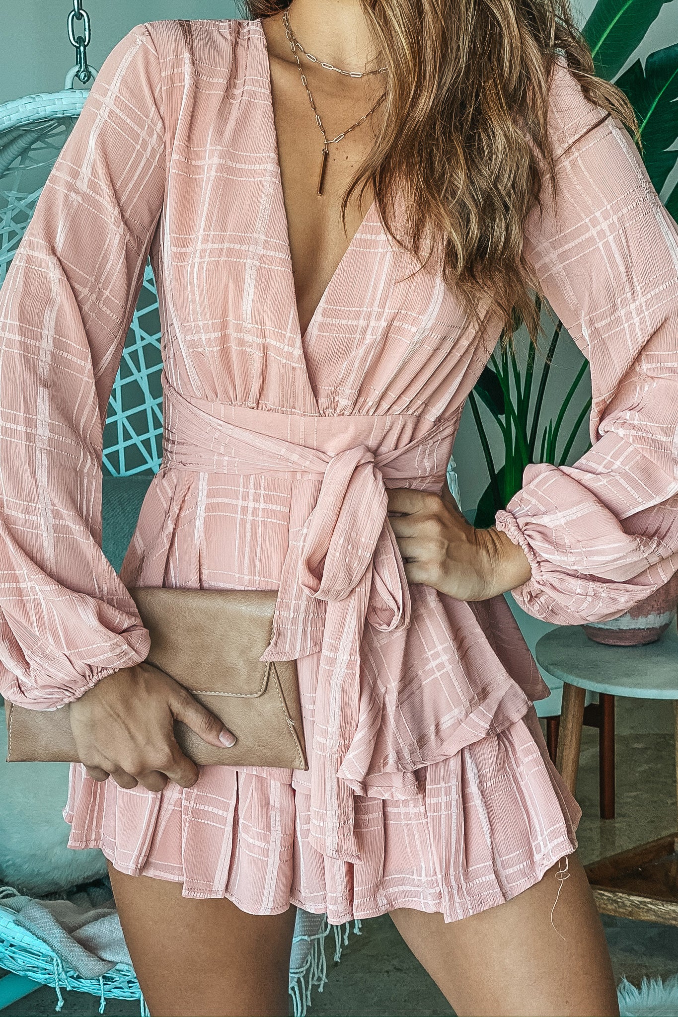 Lifestyle blush romper with puff sleeves