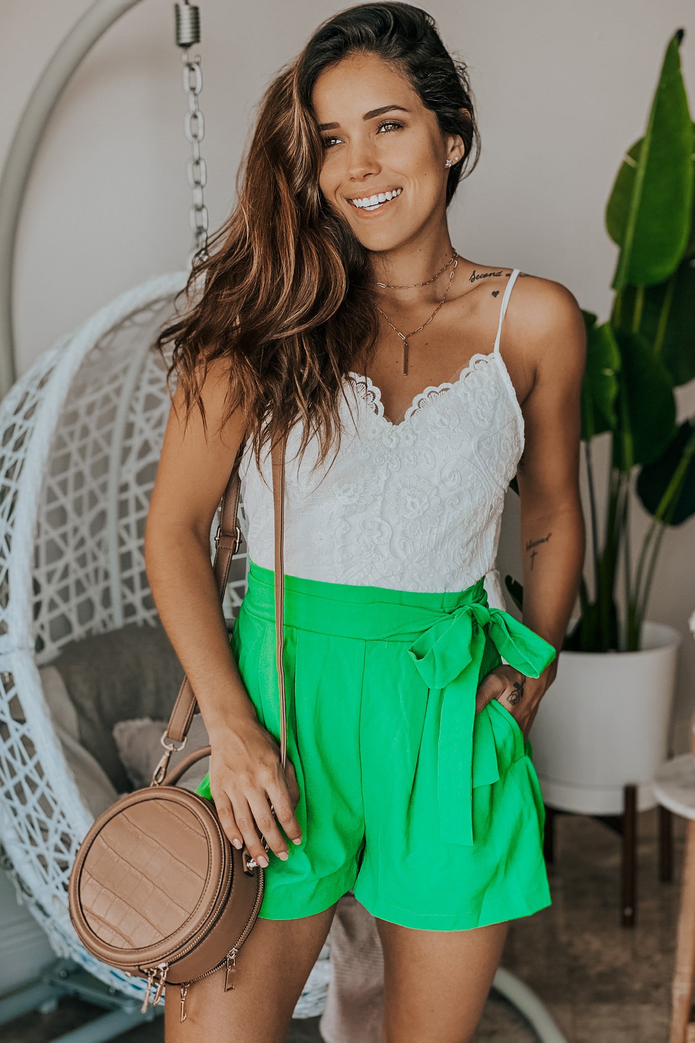 Lifestyle ivory and green romper