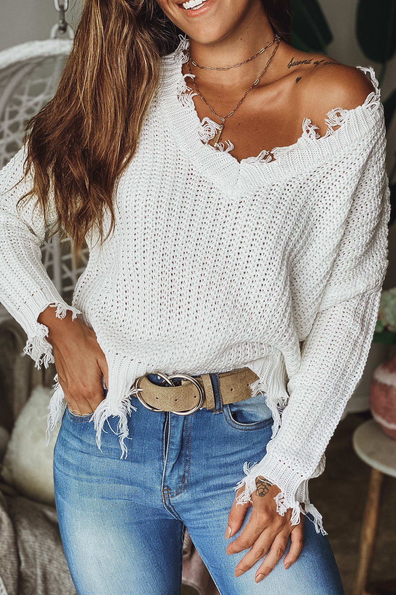 Lifestyle off white distressed v-neck sweater