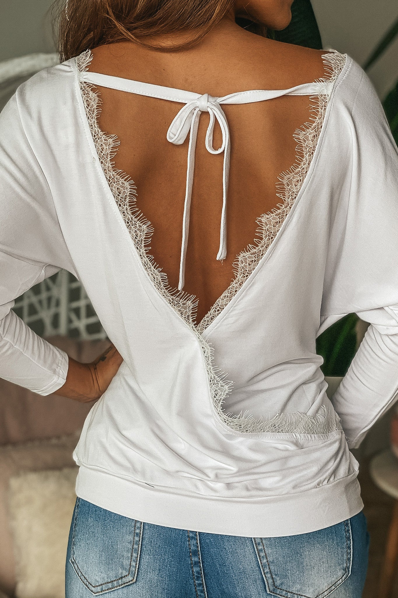 Lifestyle off white lace back detail top