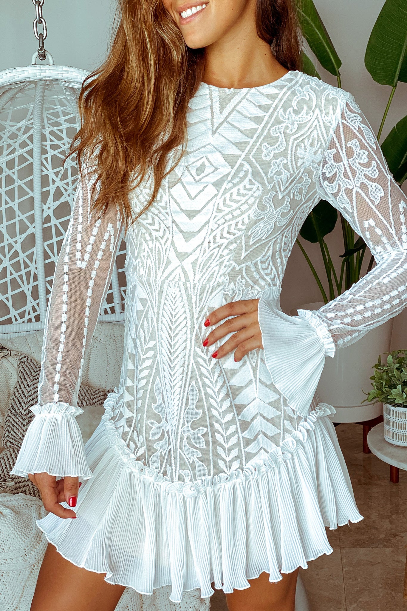 Lifestyle white long sleeve lace short dress