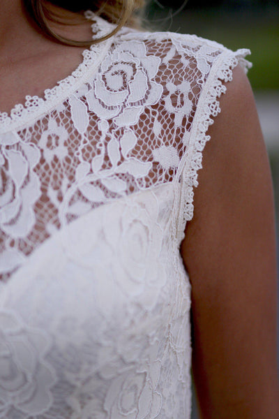 beige dress with lace details