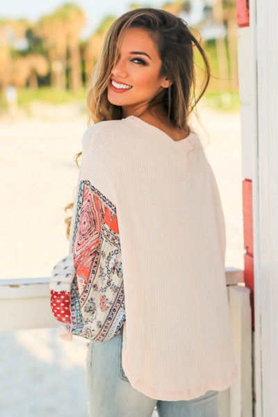 Light Peach Knit Top with Printed Sleeves