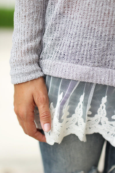 gray knitted sweater with lace trim