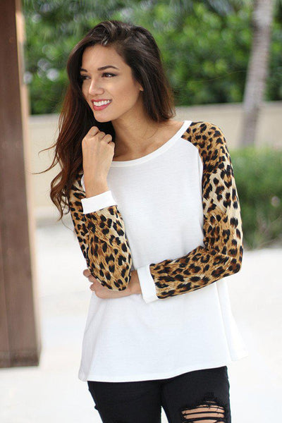 White Top with Animal Print Sleeves