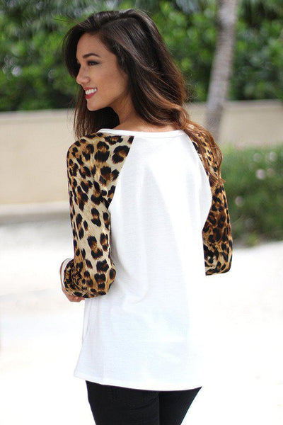 White Top with Animal Print Sleeves