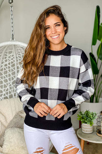 black and white checkered pullover