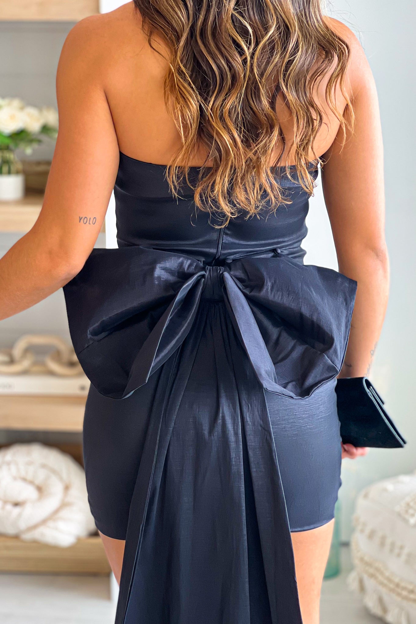 black chic dress with bow detail