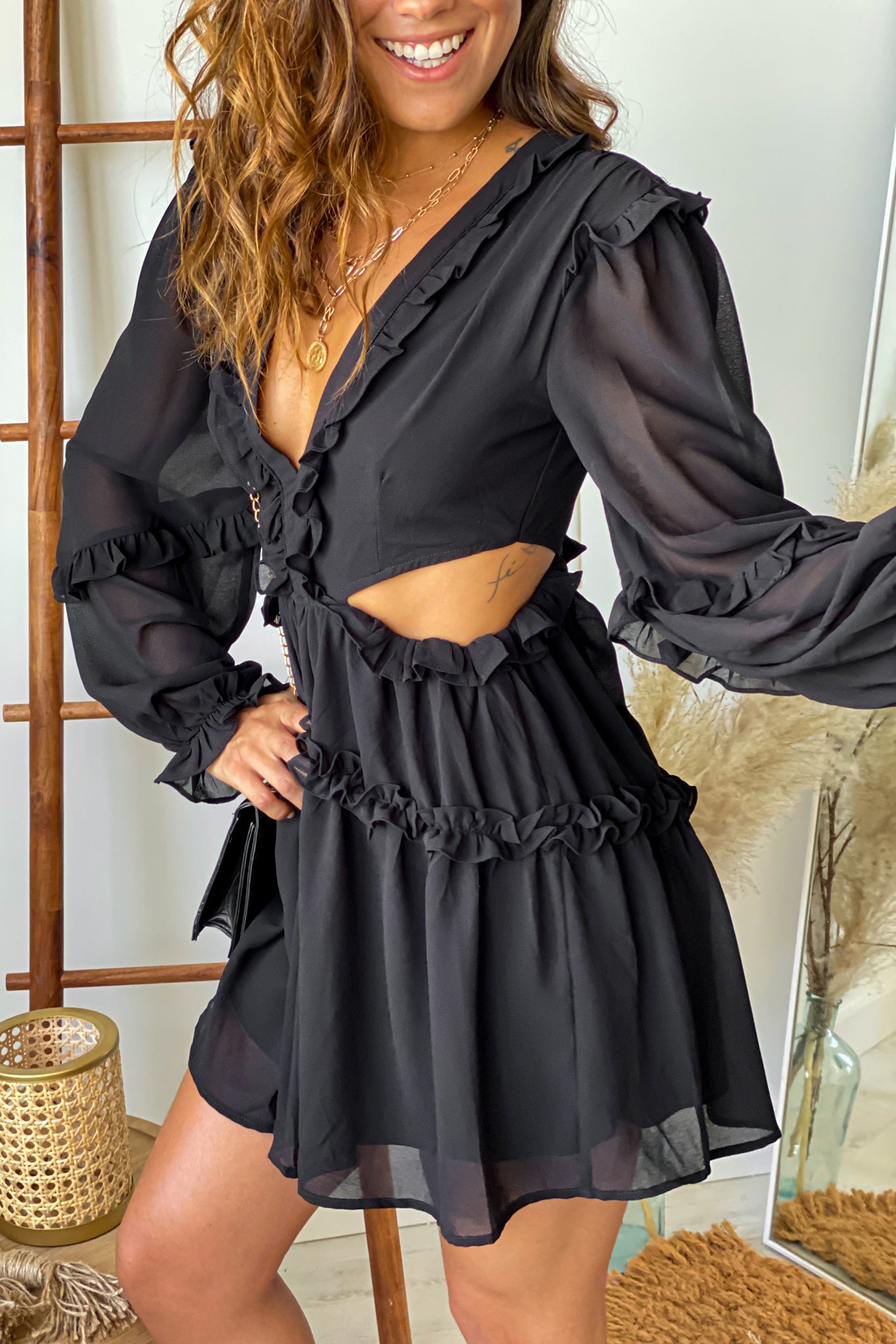 black cut out short dress with strappy back
