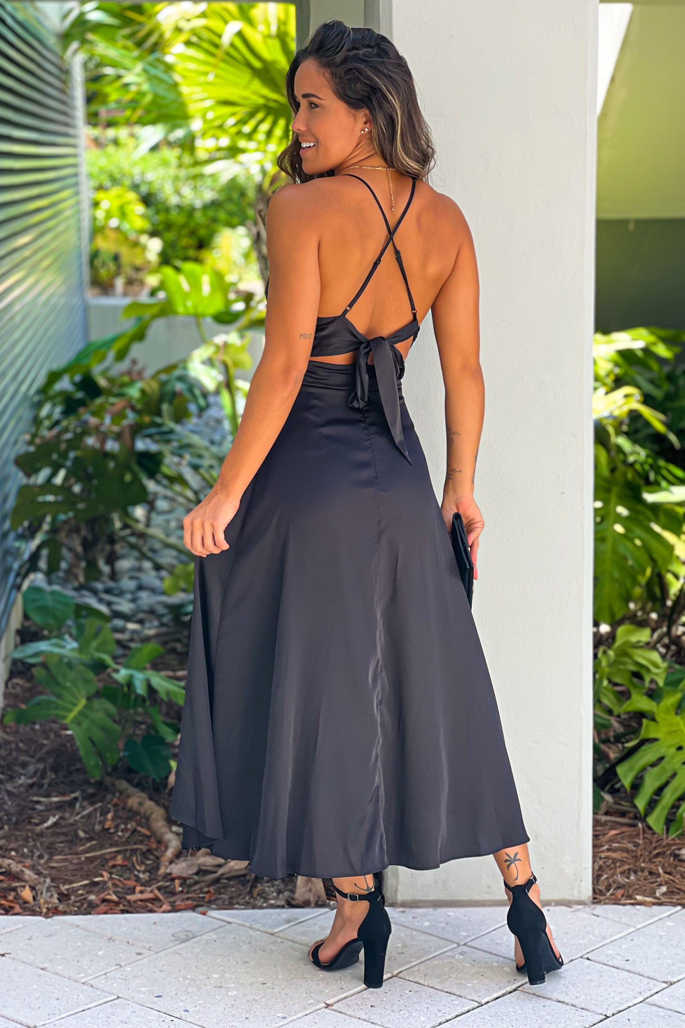 black high low dress with criss cross back