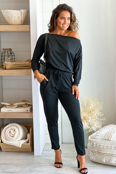 black jumpsuit with long sleeves