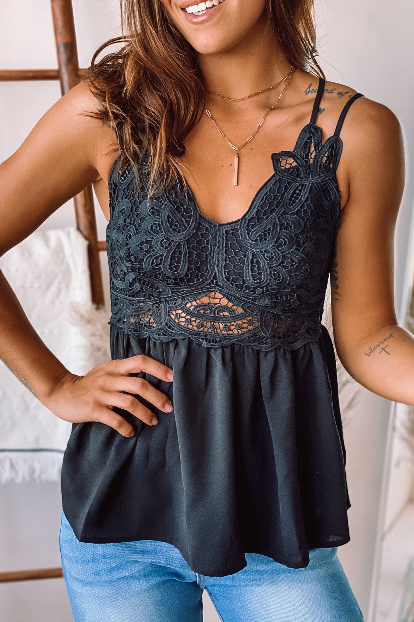 black lace top with criss cross back