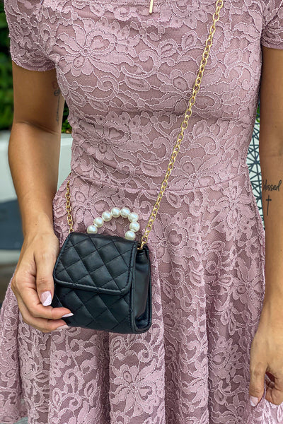 black quilted clutch