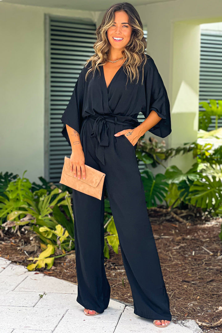 Black Satin V-Neck Jumpsuit With Pockets | Cute Jumpsuits – Saved