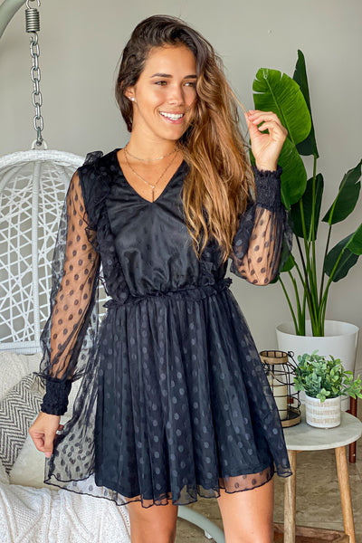 black short dress with long sleeves