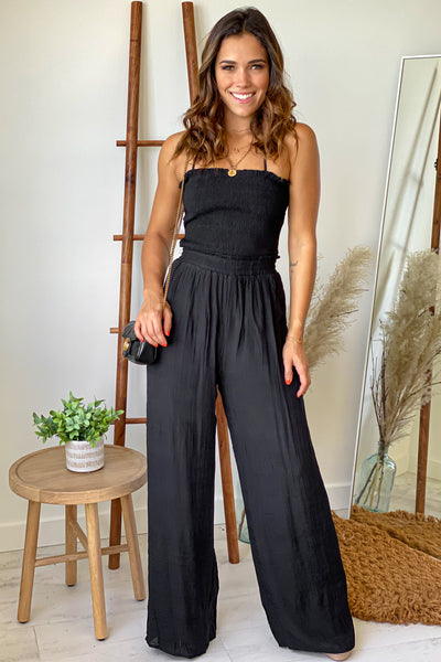black strapless jumpsuit with smocked top